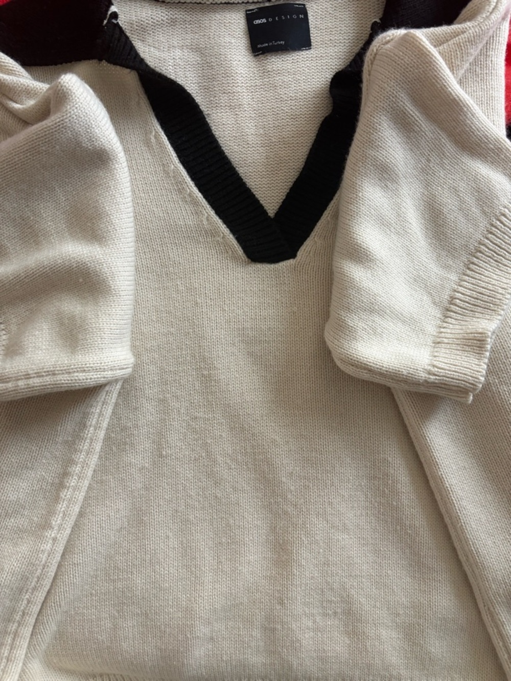 Cream V-Neck Sweater with Black Trim
